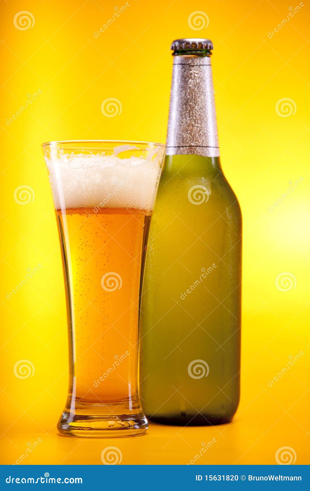 Beer on yellow background stock photo. Image of foam 15631820