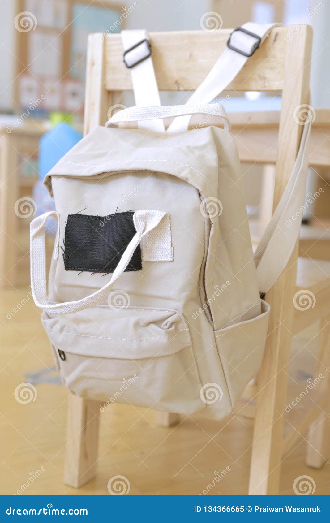 Beige Kid Backpack Hanging On A Chair Stock Image Image Of