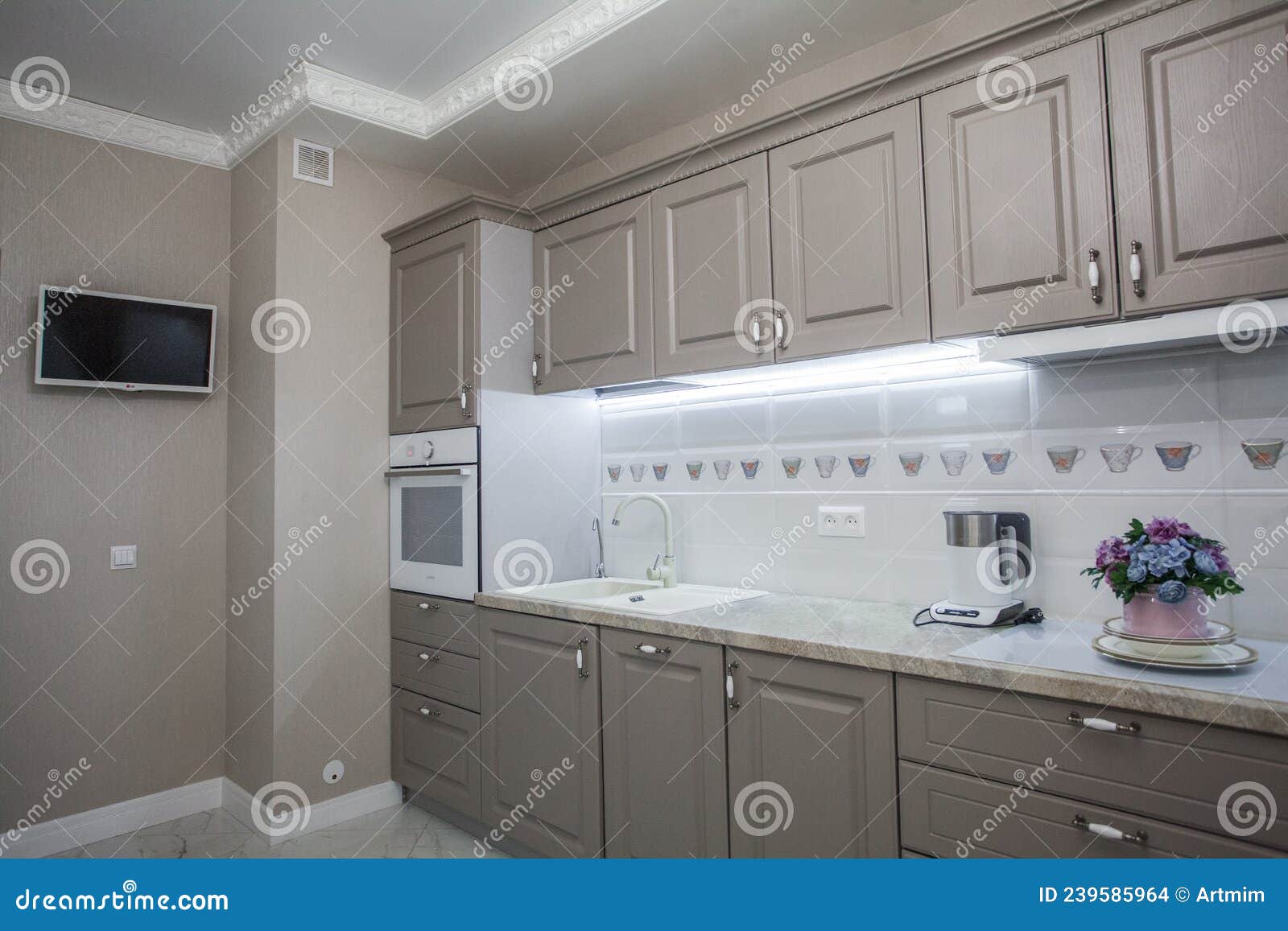 beige wooden cupboards in modern kitchen