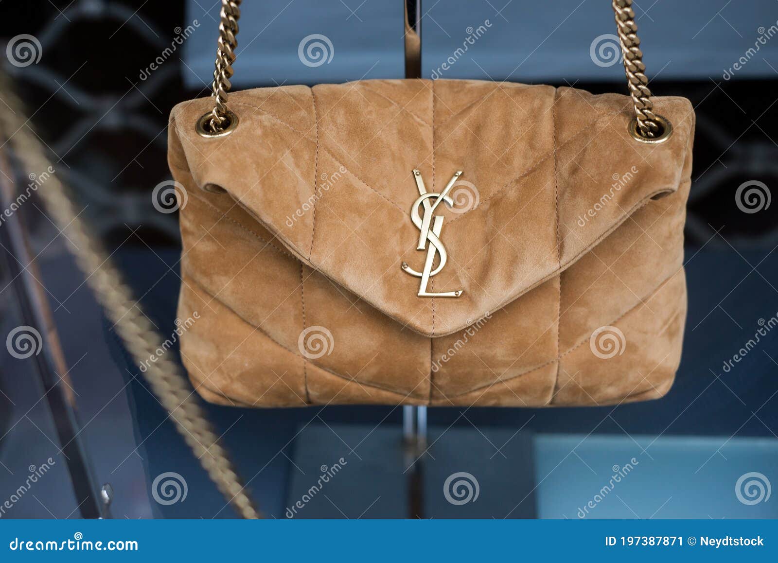 Beige Yves Saint Laurent Handbag in a Luxury Fashion Store Showroom  Editorial Photo - Image of brown, commerce: 197387871