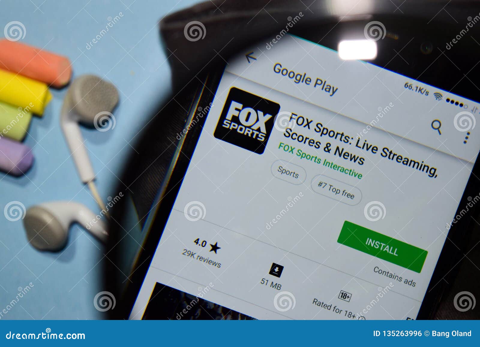 FOX Sports Live Streaming, Score and News Dev App with Magnifying on Smartphone Screen Editorial Photo