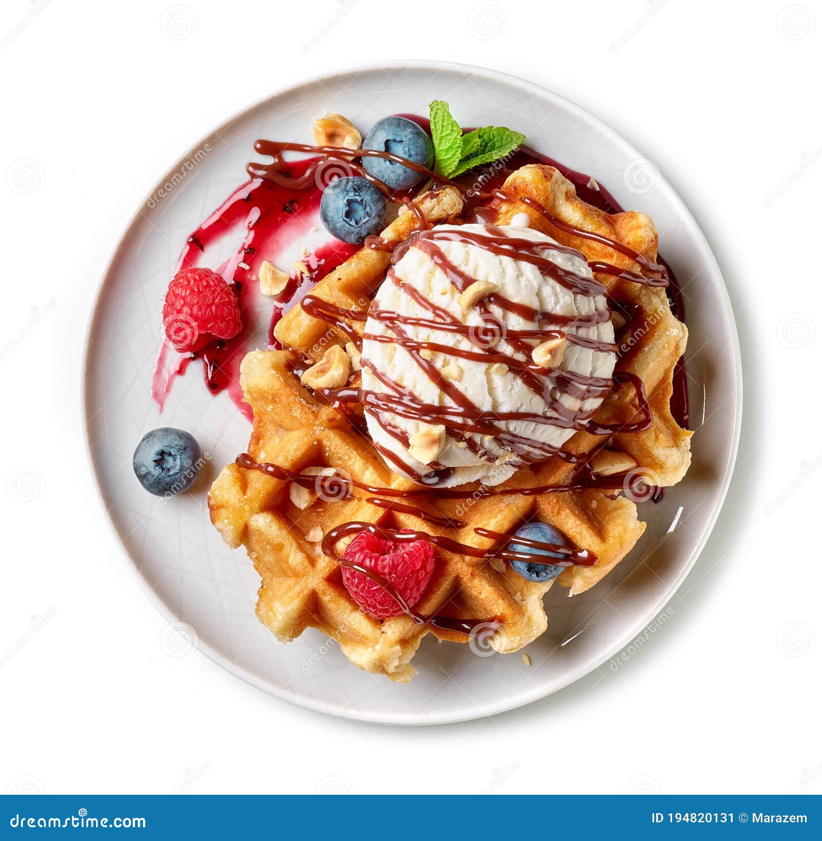 belgian waffle with ice cream and fresh berries