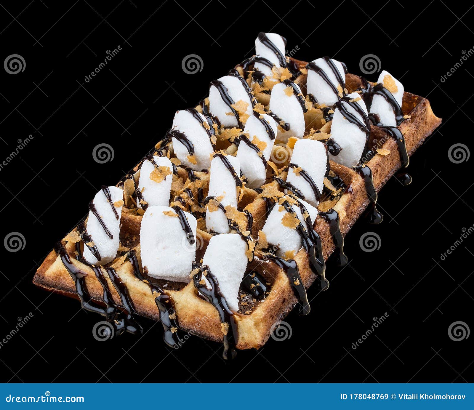 Belgian Waffle with Marshmallows and Chocolate. on Dark Background