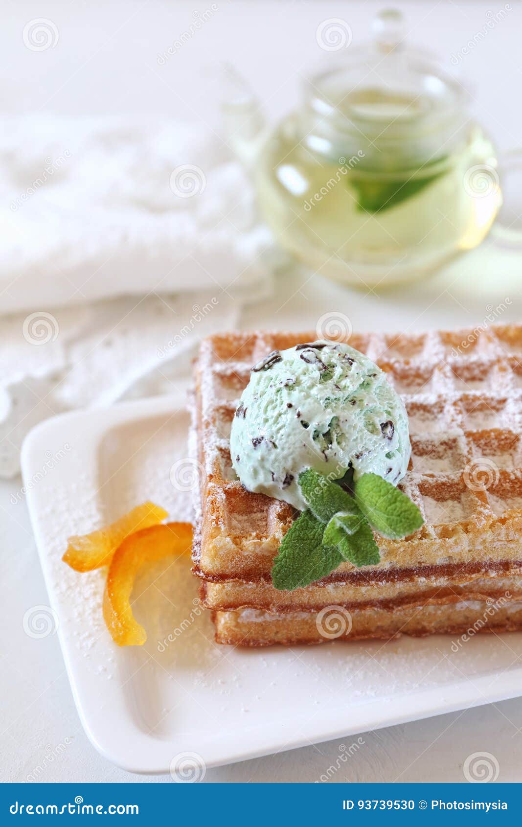 Belgian Waffles with Mint Chocolate Chip Ice Cream and Mint Tea Stock
