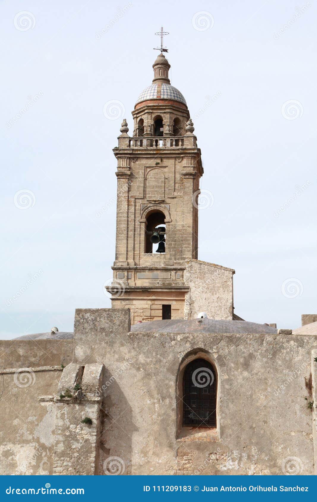 bell tower of the mayor church, in the town of medina sidonia, spain