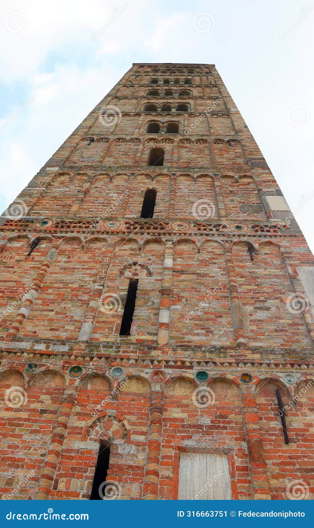 bell tower of pomposa abbey a benedictine monastery from below