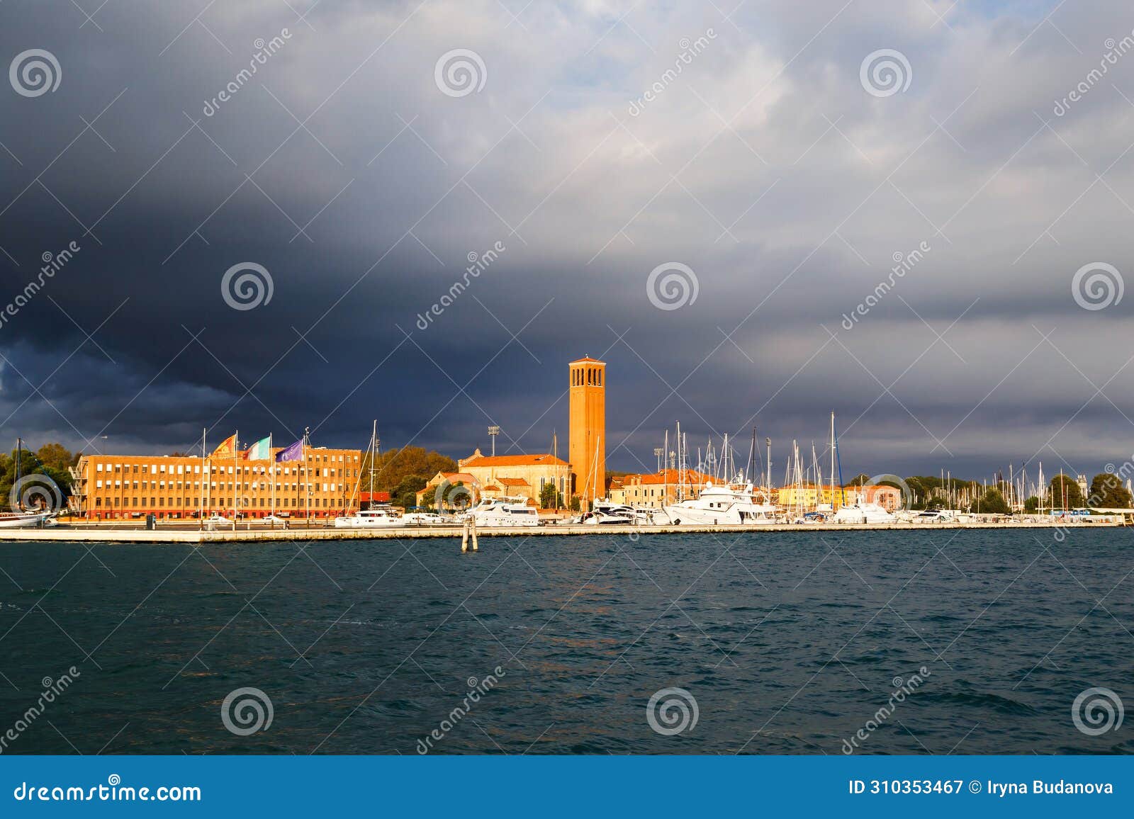 bell tower of sant'elena church and yacht harbor at extreme east end of sestiere of castello in venice, italy. view