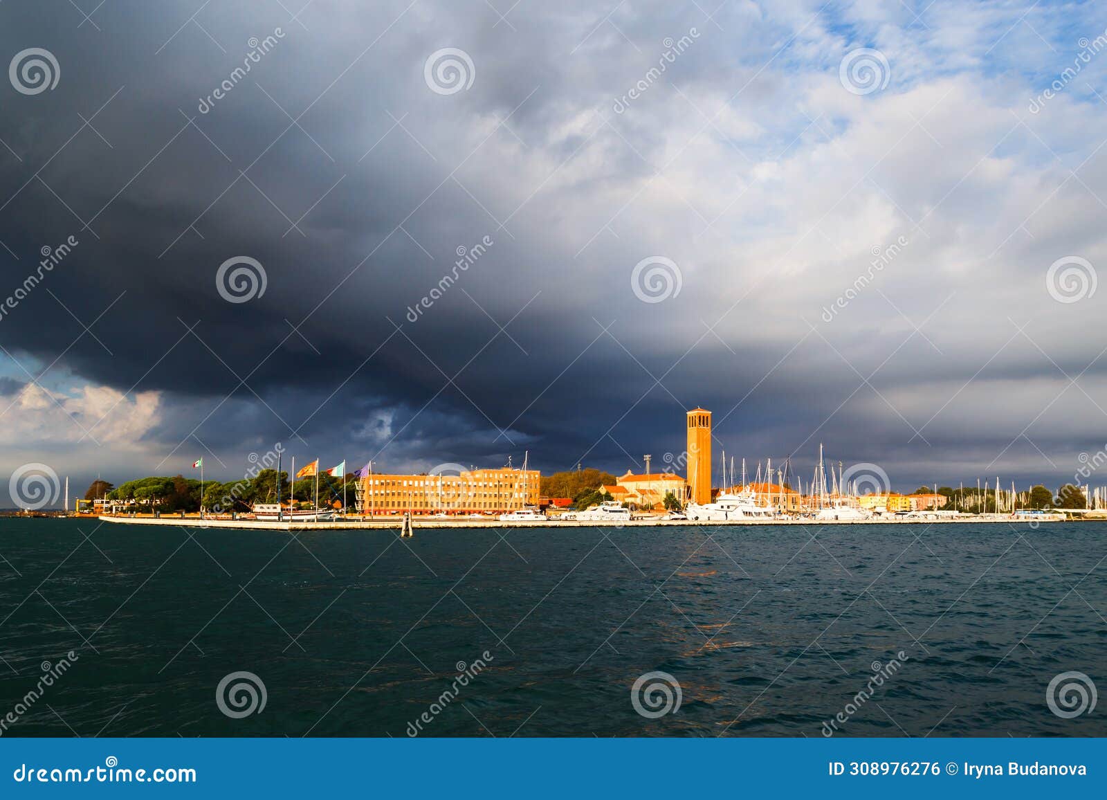 bell tower of sant'elena church and yacht harbor at extreme east end of sestiere of castello in venice, italy. view