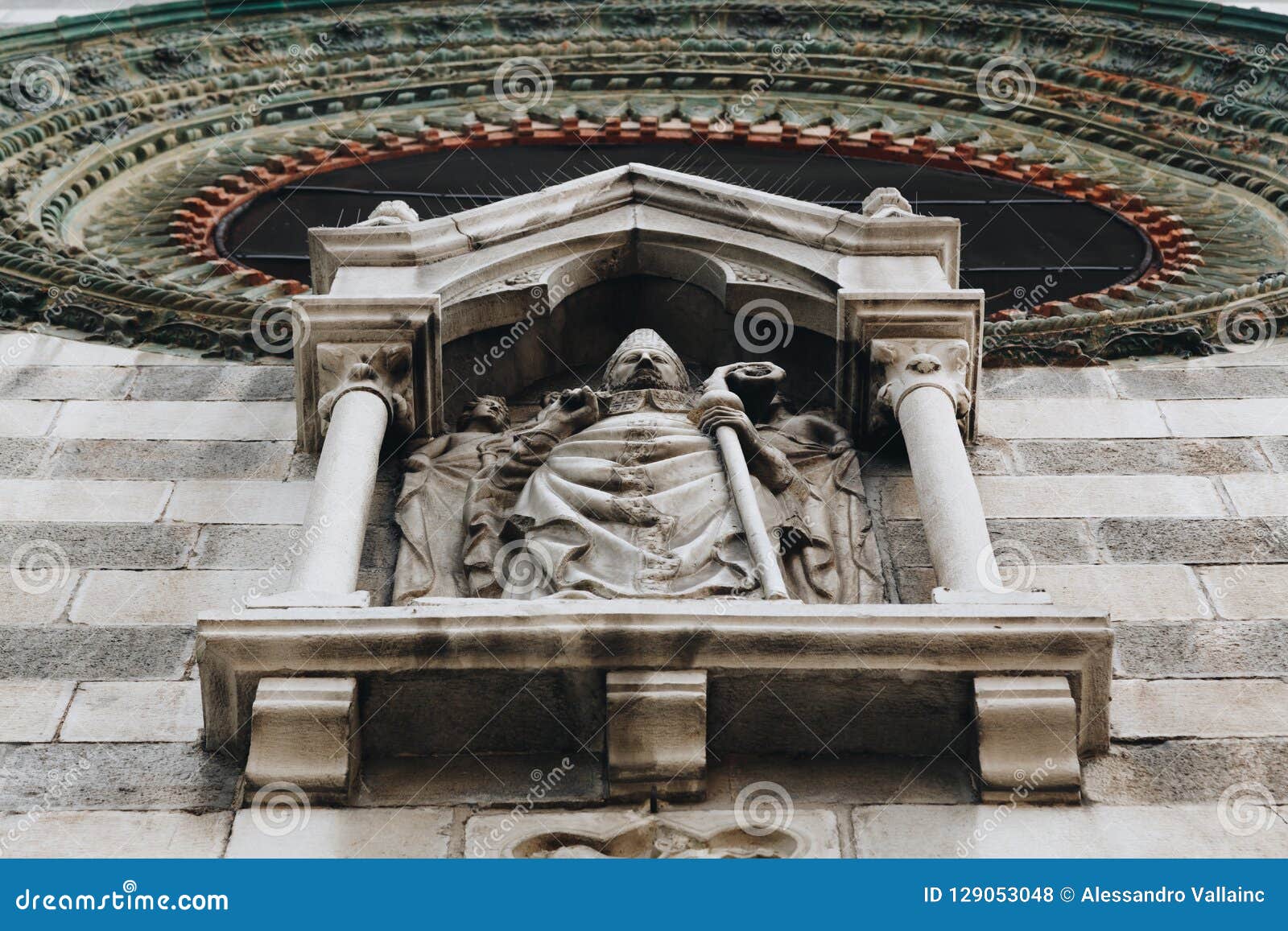 bellano como lake - italy sept 2018 - details of statue and decoration of the church of saints nazaro and celso in bellano.