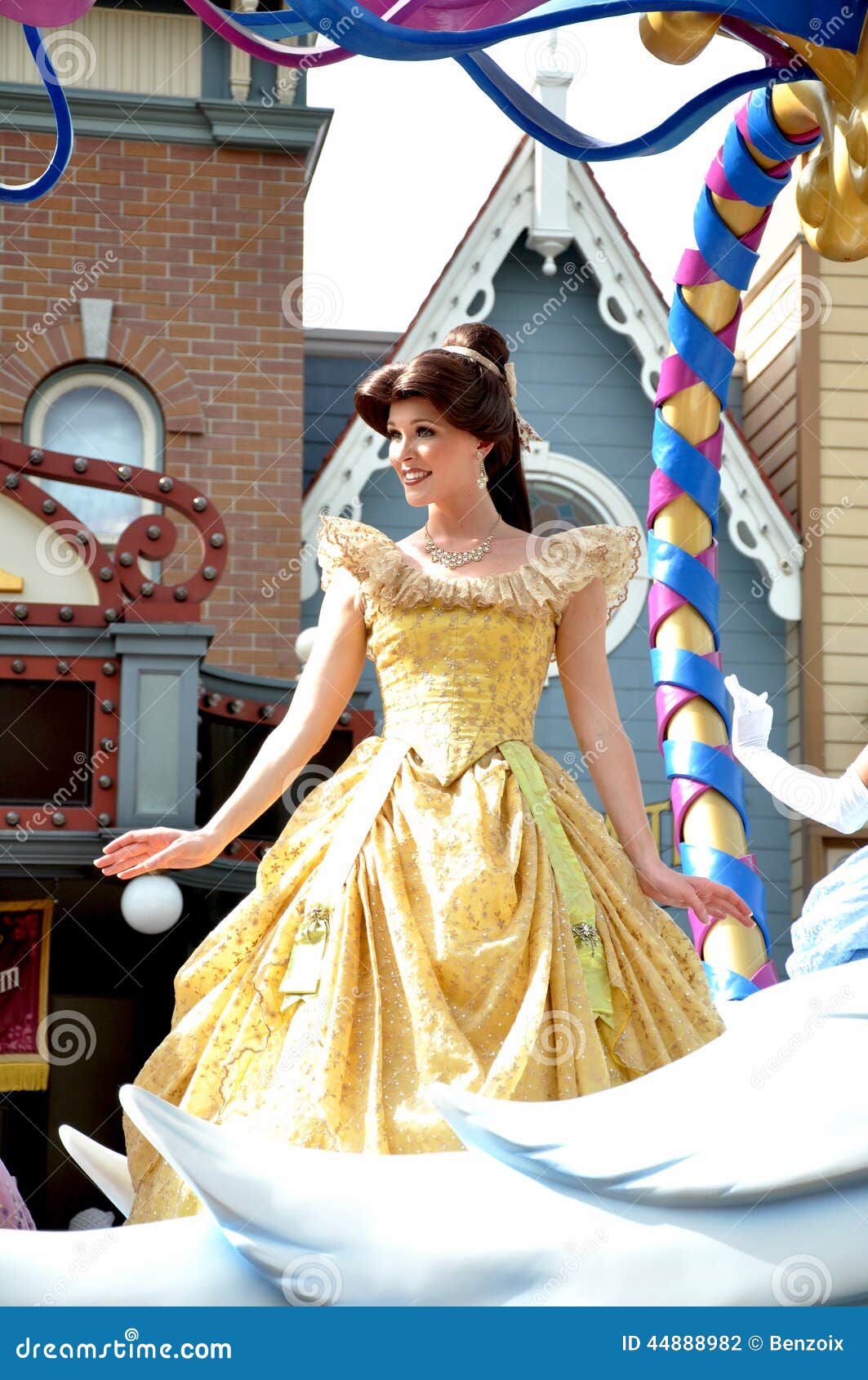 Belle in Disney Princess editorial photography. Image of gold