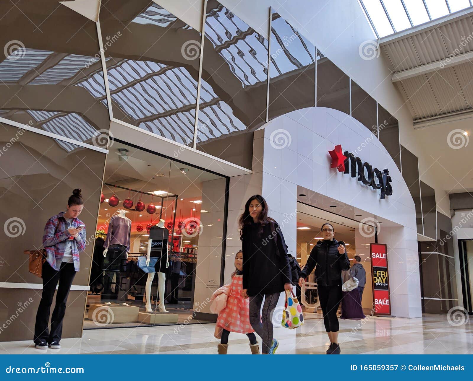 People Shopping at Macy`s in the Bellevue Square Mall As Black Friday