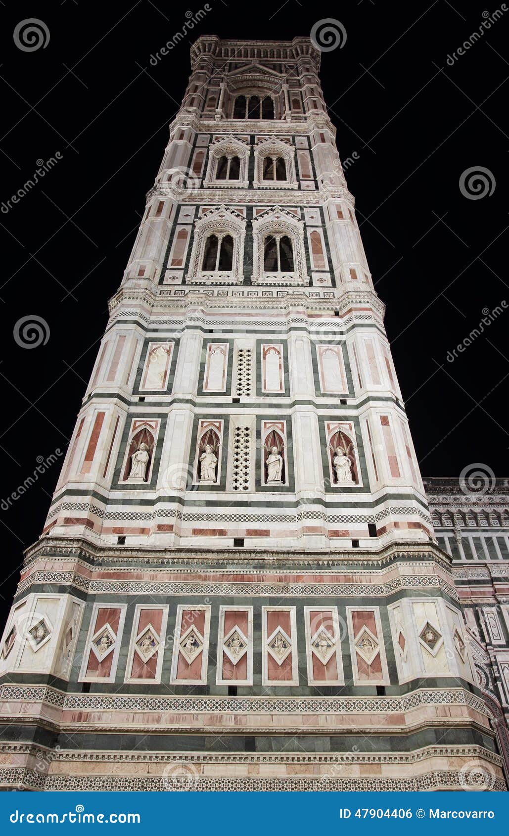 Belltower by Giotto in Florence. Santa Maria del Fiore cathedral with the gothic Bell tower by Giotto at night, Florence, Italy