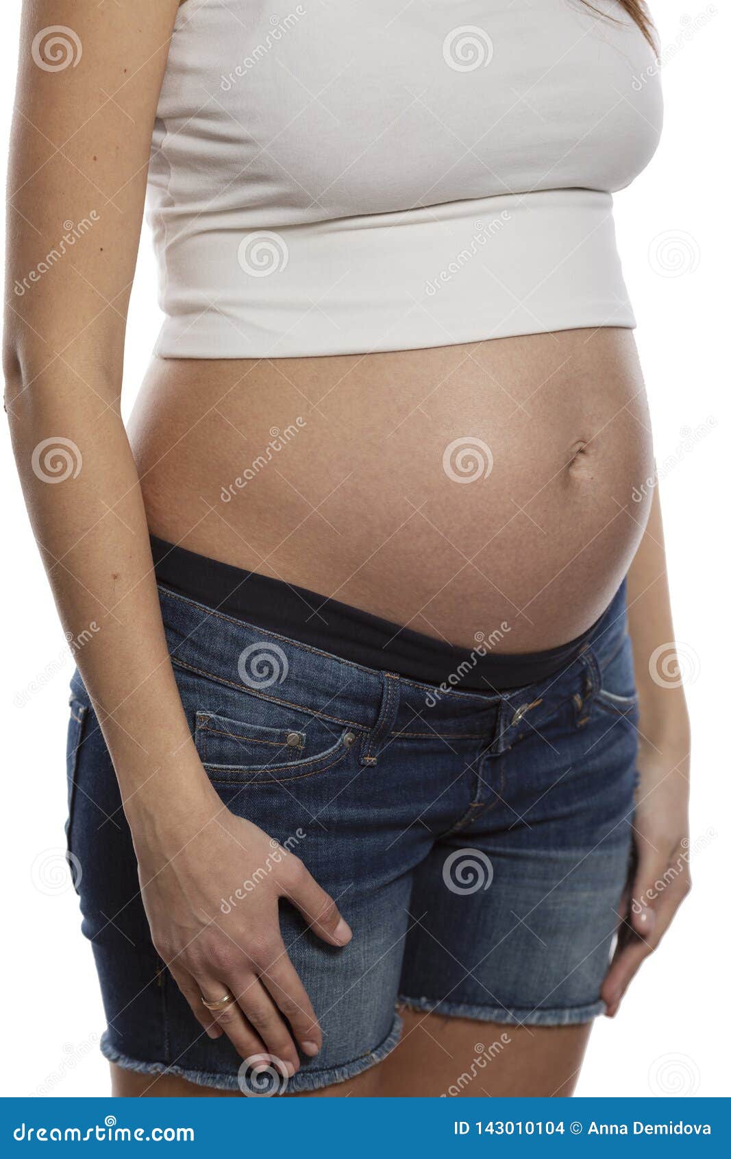 Six months pregnant belly