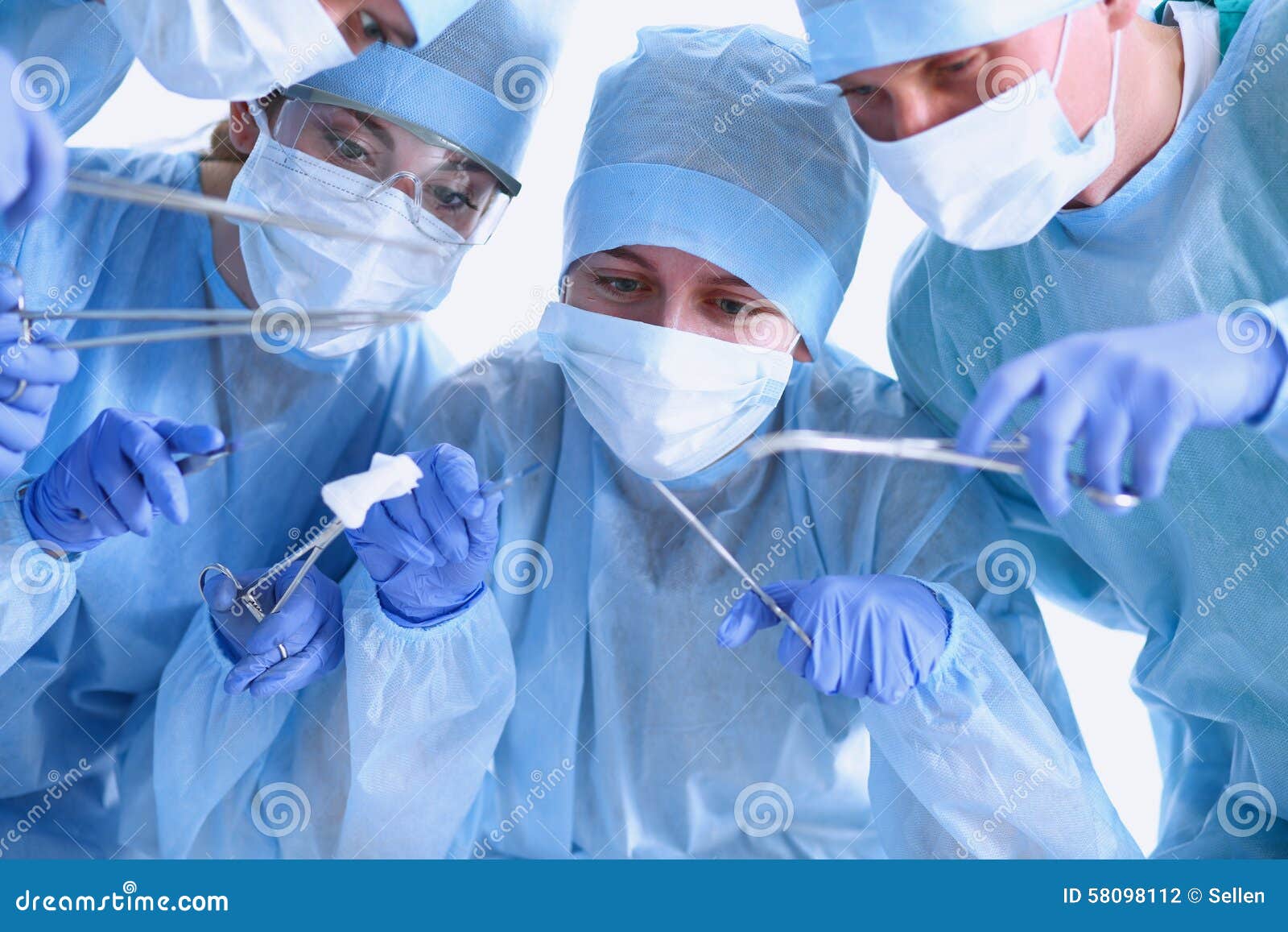 Below View of Surgeons Holding Medical Instruments Stock Photo Image
