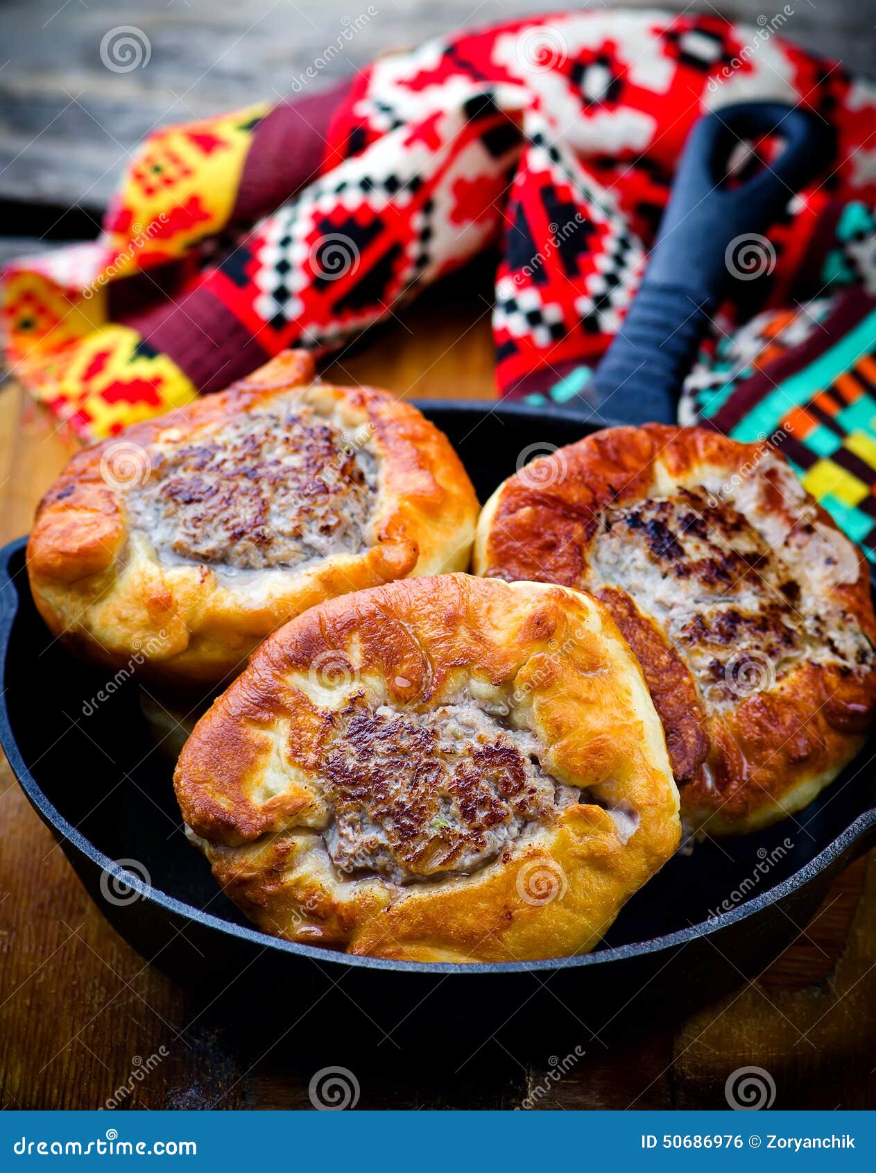 belyash ,yeast dough round pasty with meat filling .