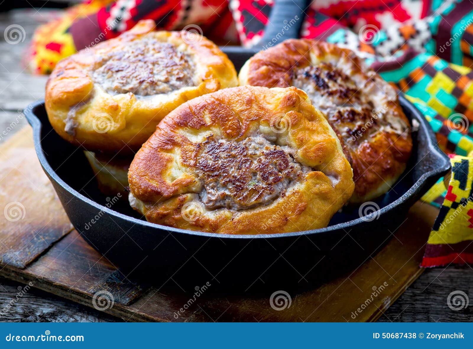 belyash ,yeast dough round pasty with meat filling .
