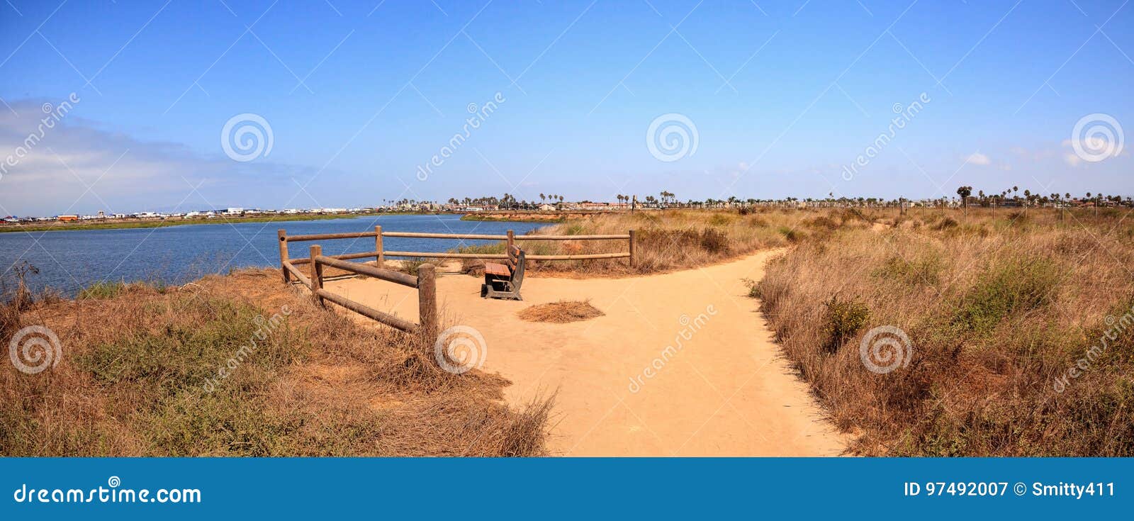 bench overlooking the peaceful and tranquil marsh of bolsa chica wetlands