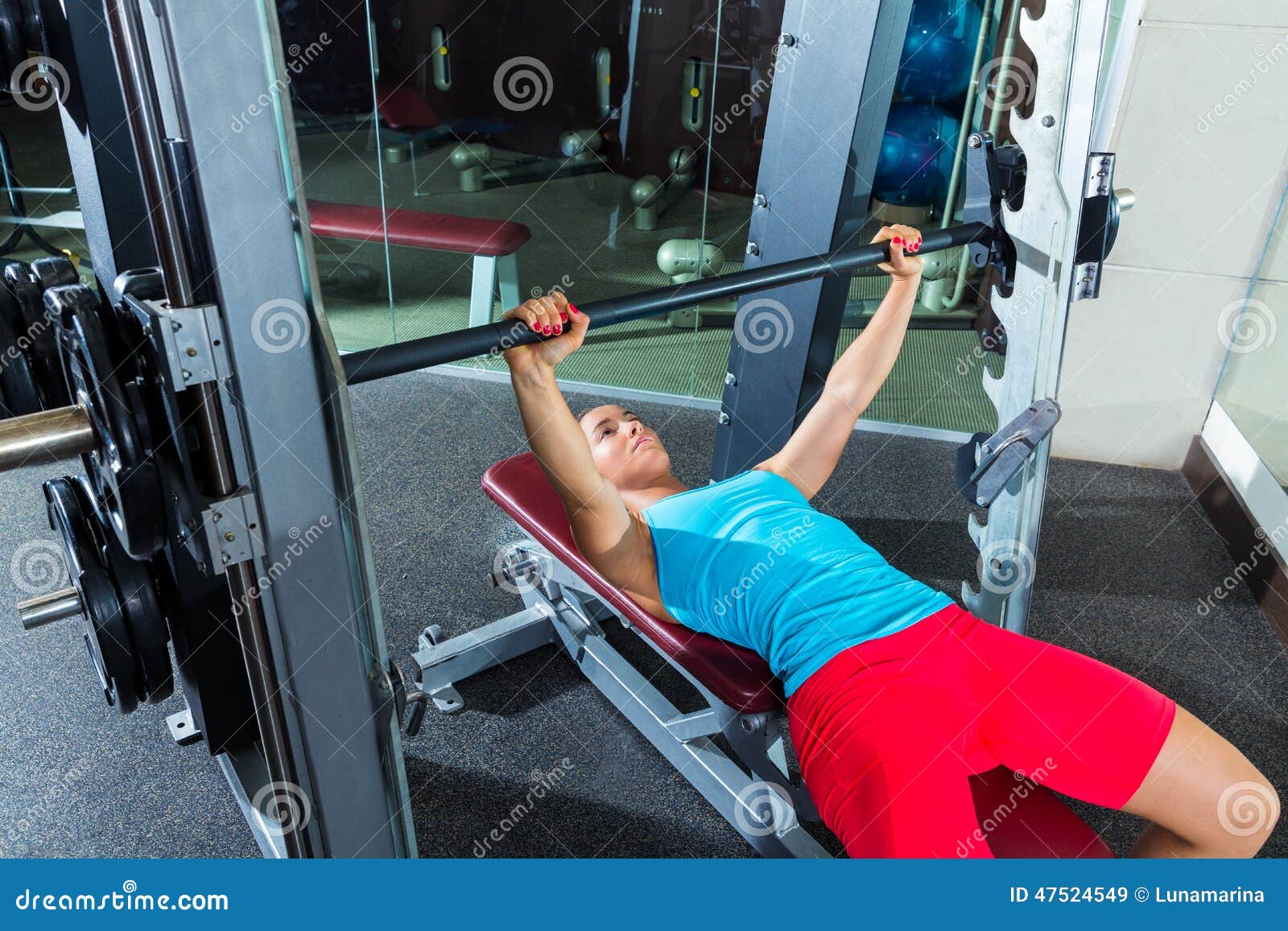 https://thumbs.dreamstime.com/z/bench-press-girl-flat-multipower-smith-machine-woman-workout-exercise-gym-47524549.jpg