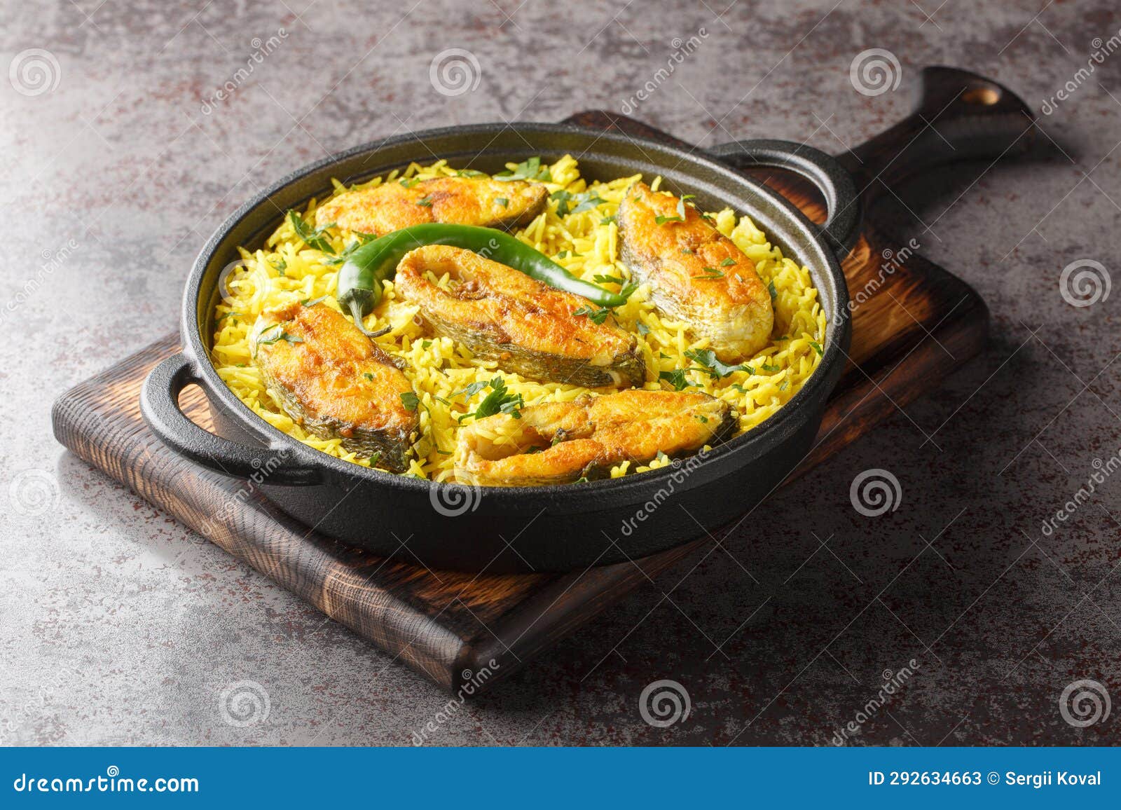 Bengali Style Fish Pilaf Cooked with Ilish Fish Closeup on the Black