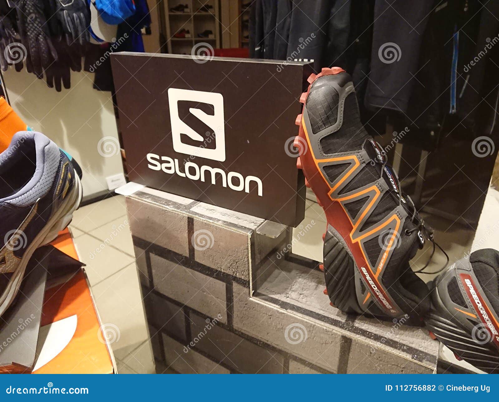 Salomon shoes editorial photography. of logo - 112756882