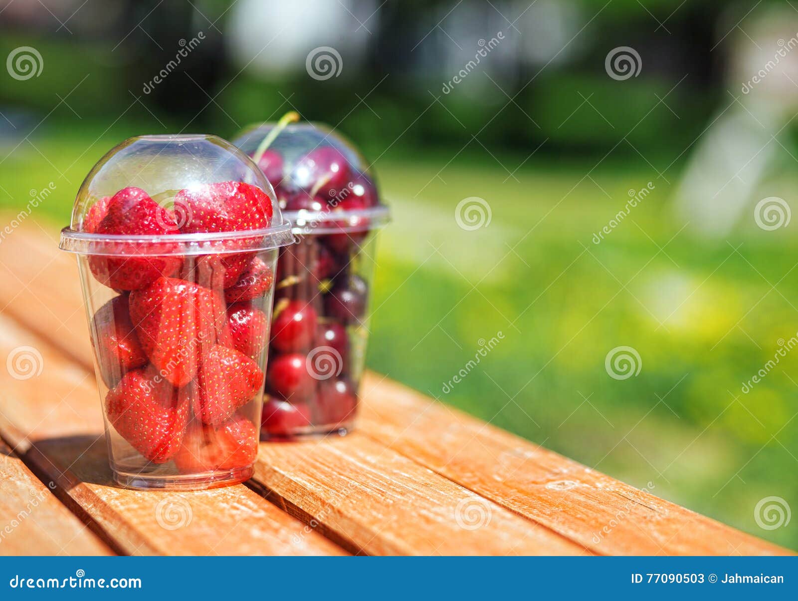 Berries in plastic cup stock image. Image of away, berry 77090503