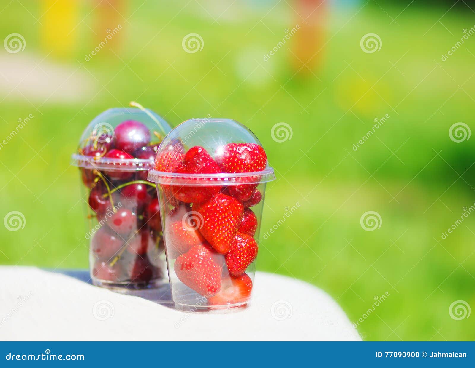 Berries in plastic cup stock photo. Image of fresh, juicy 77090900