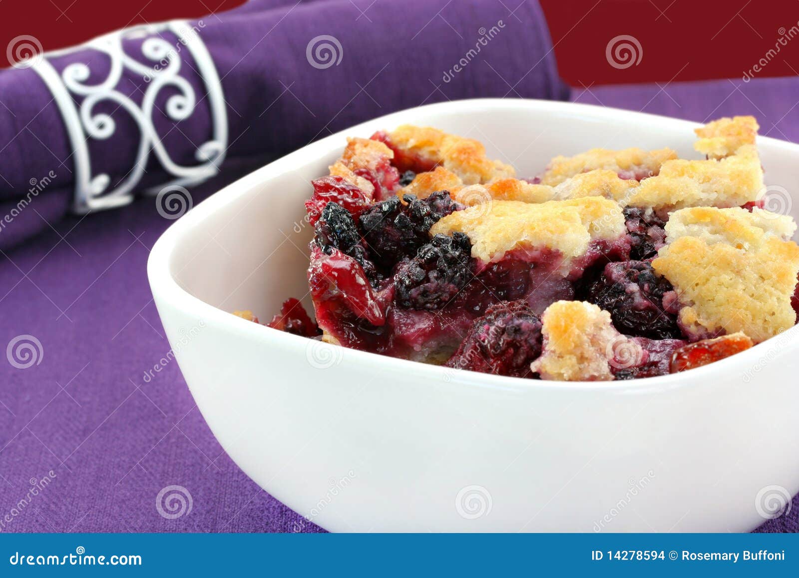 berry cobbler in a bowl.