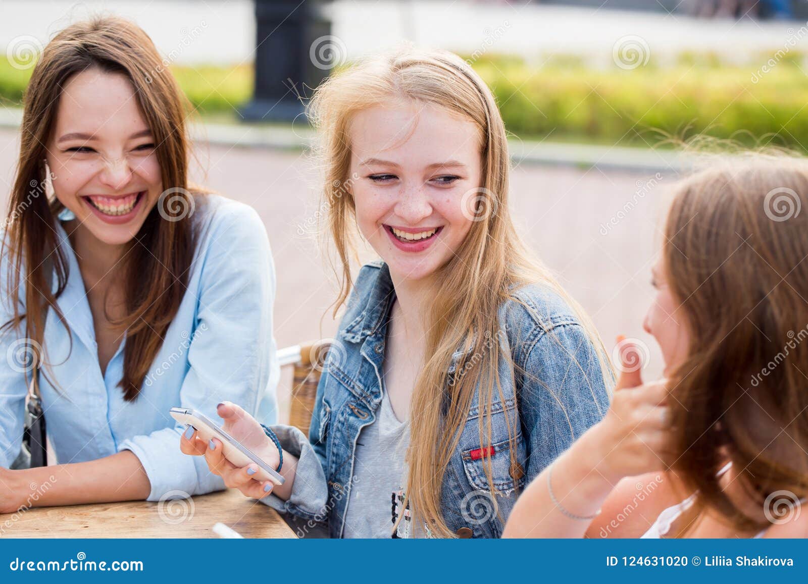 Best Friends Relax in the Park, Laugh and Rejoice. Emotions, Happiness ...