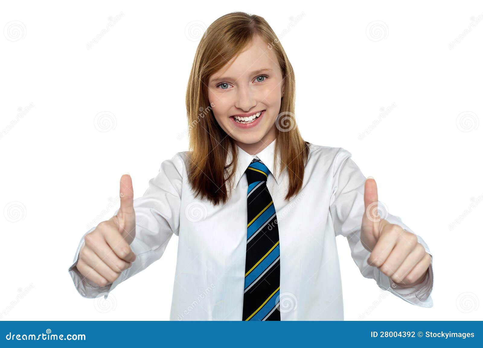 Best of luck for your annual examinations. Young schoolgirl gesturing double thumbs up sign to the camera.