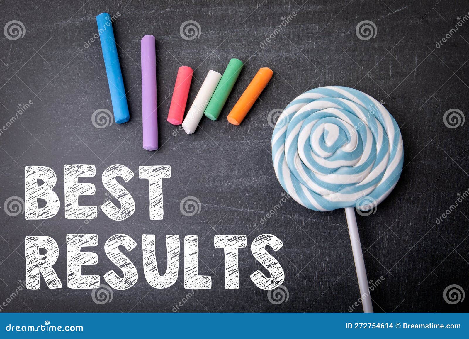Best Results. Text and Colored Pieces of Chalk on a Dark Chalkboard