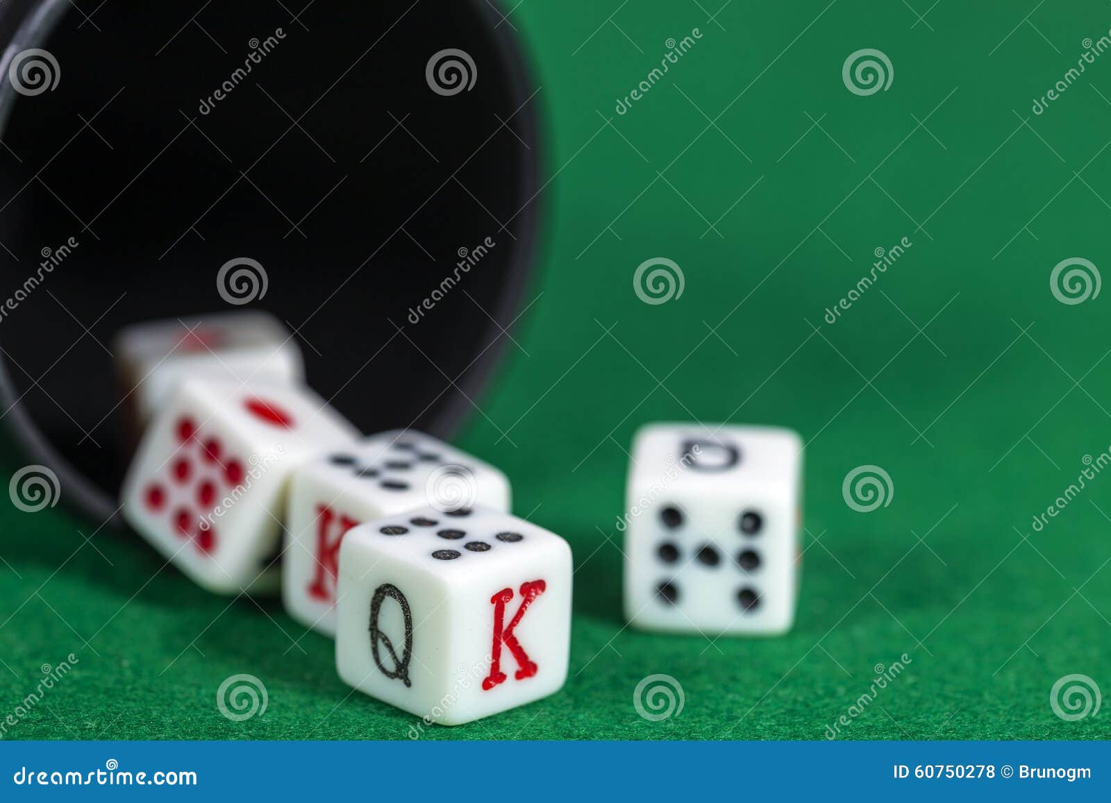 A Beaker With Poker Dice On A Green Table Stock Photo CartoonDealer