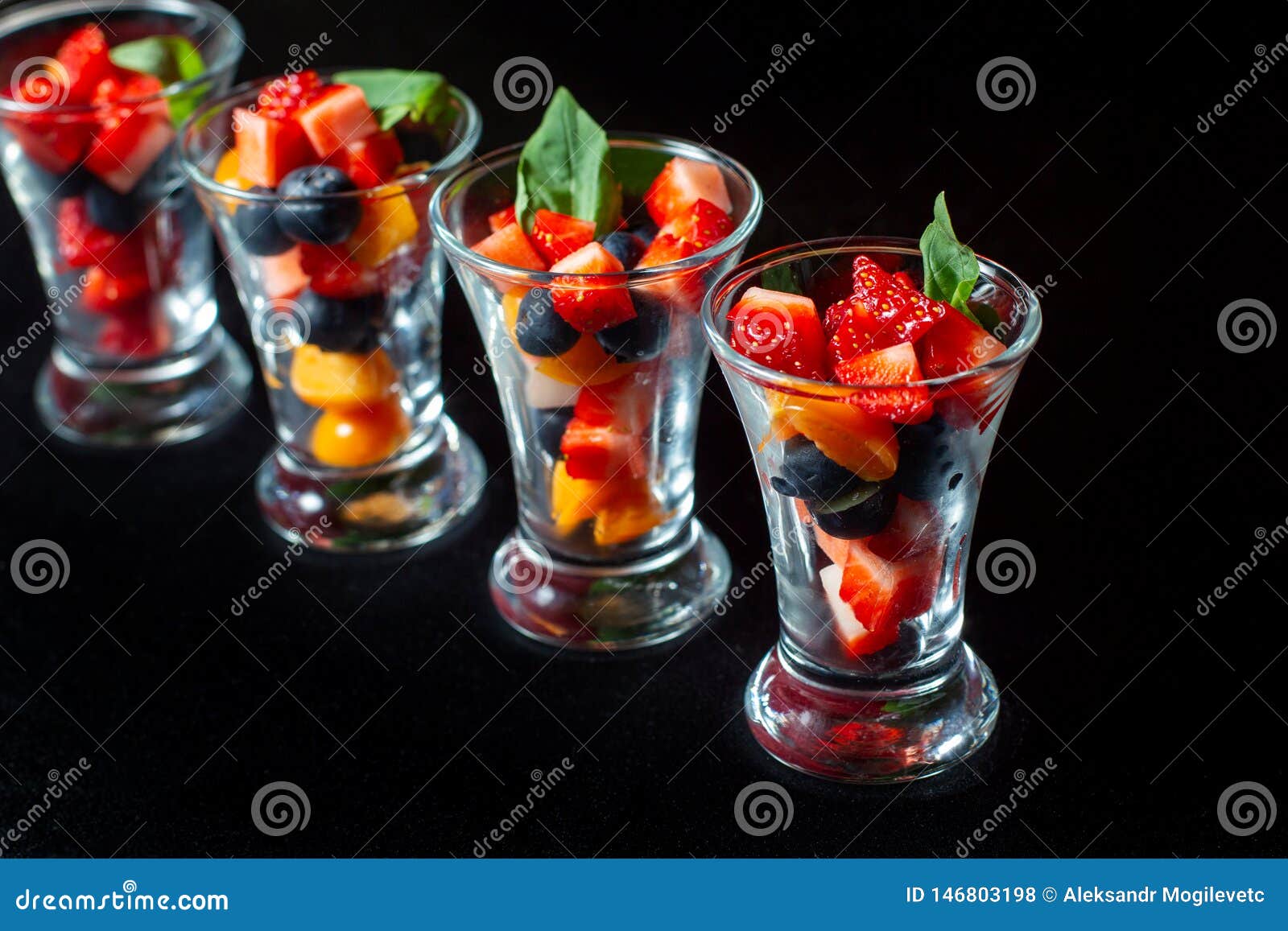 Four Cups with Sliced Strawberries and Blueberries Stock Photo Image Four Cups with Sliced Strawberries and Blueberries Stock Photo Image