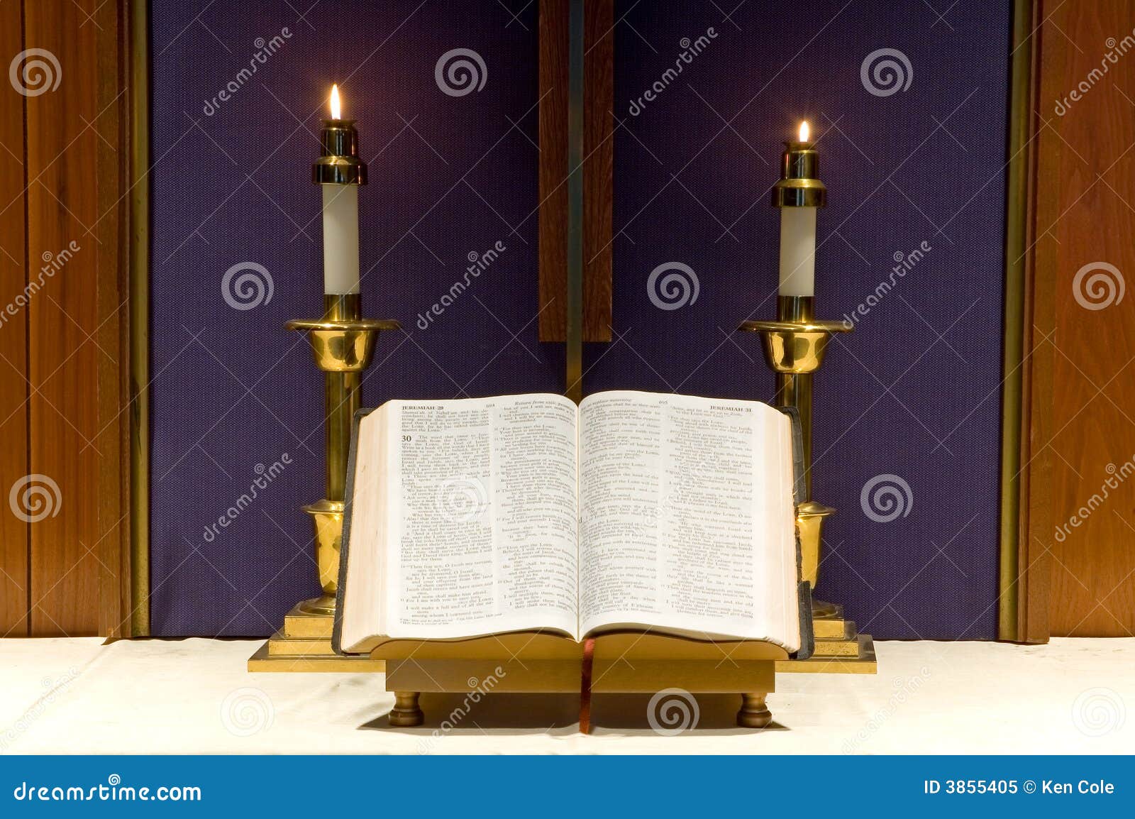 bible and candles on altar