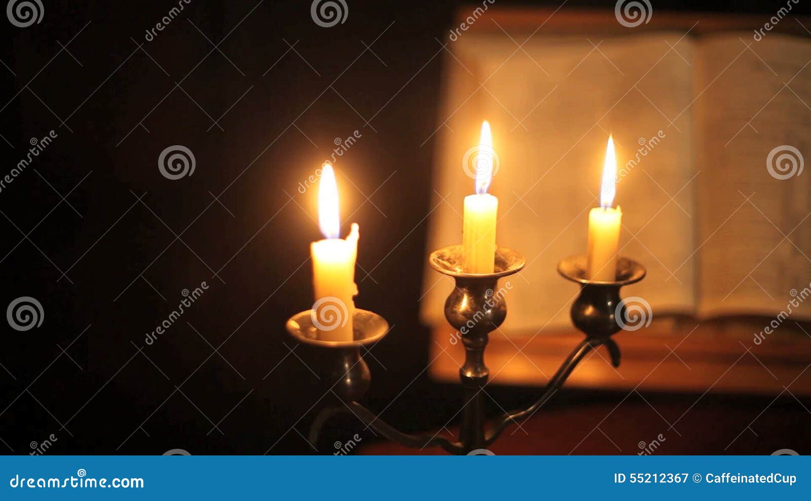 Bible and candles pan stock video. Video of candelabra 55212367