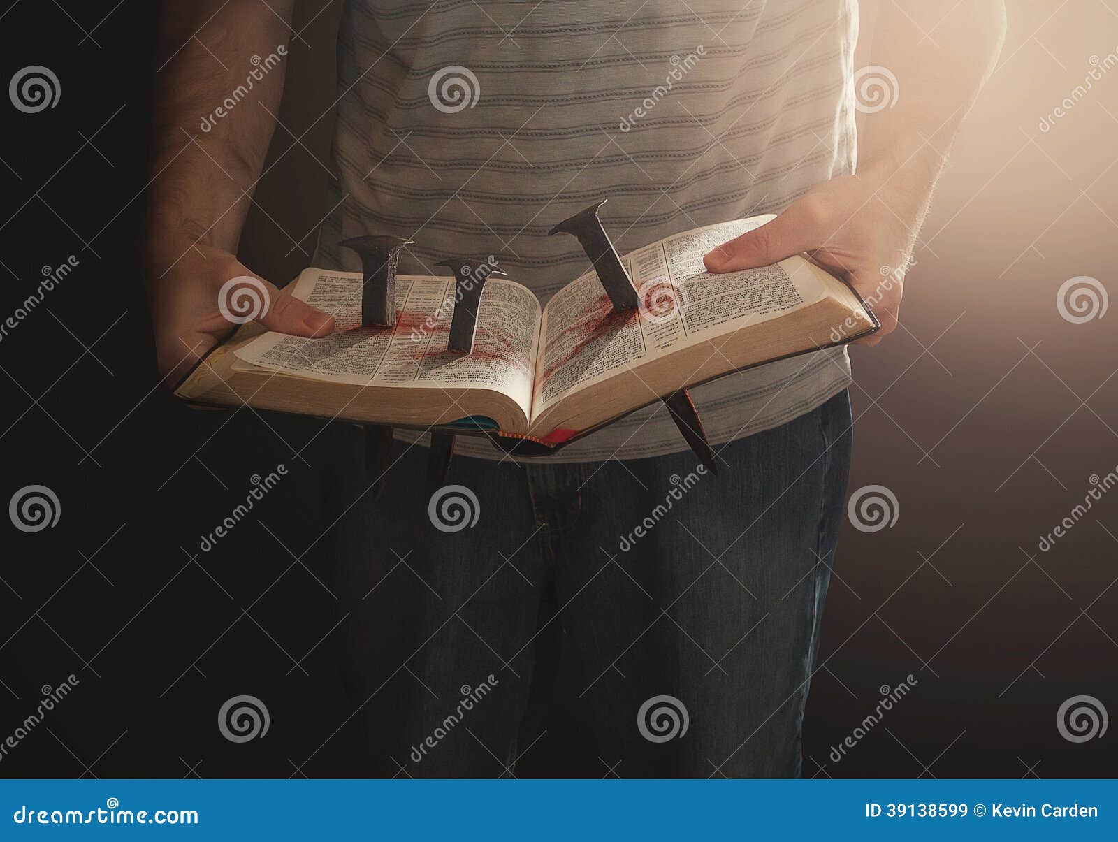 Bible with nails stock image. Image of hands, page, surreal 39138599