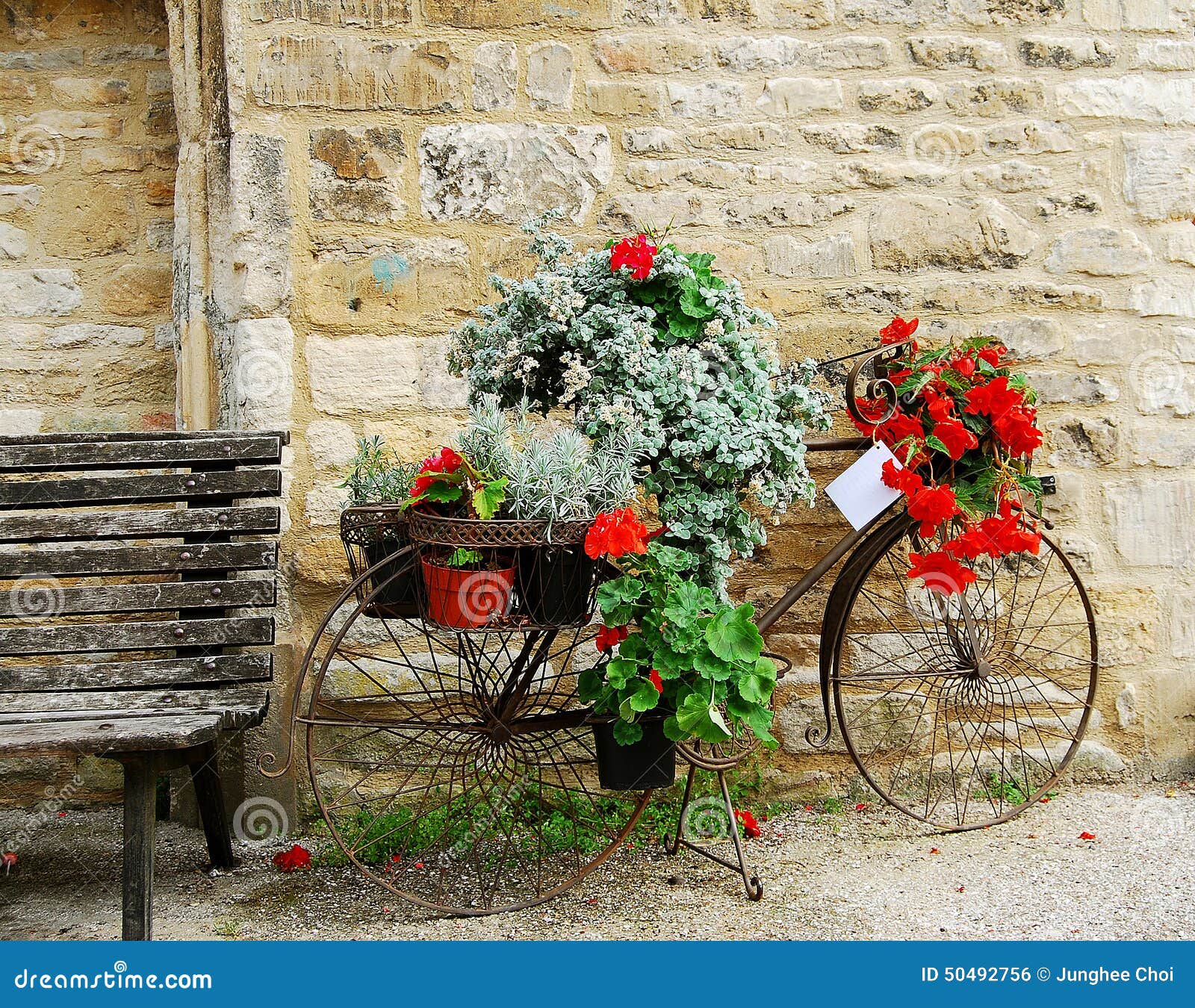 bicycle with flowers displayed in cotswolds