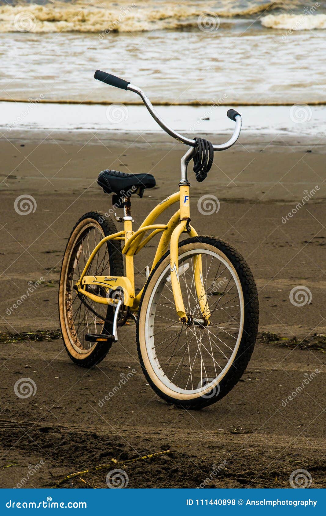 A Bicycle Park on the Sand Beach during a Stormy Evening with the Ocean ...