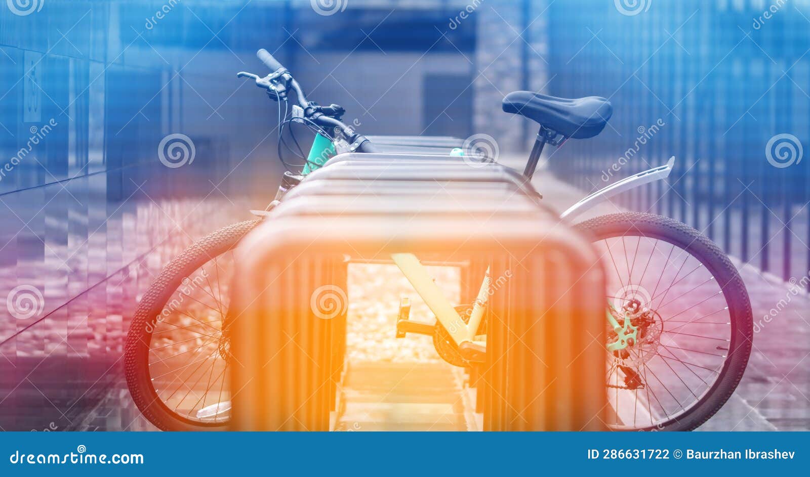 Bicycle on Parking Lot of Office Buildings during Sunset Stock Photo