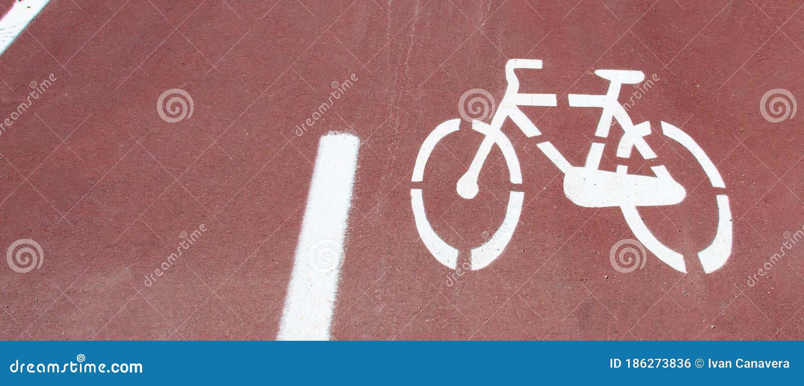 bicycle path, two way cycling track with bicycle signs painted white