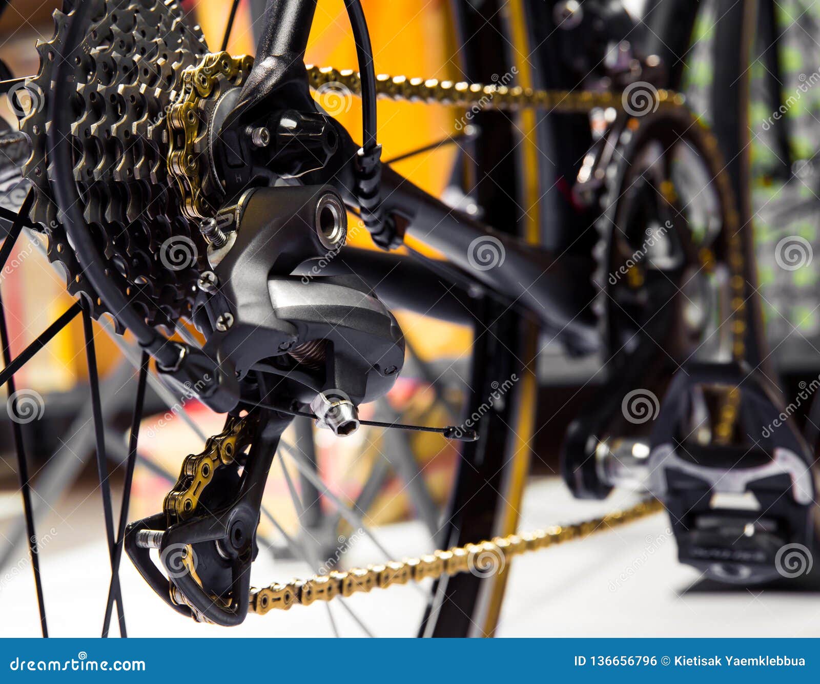 black bike gold chain