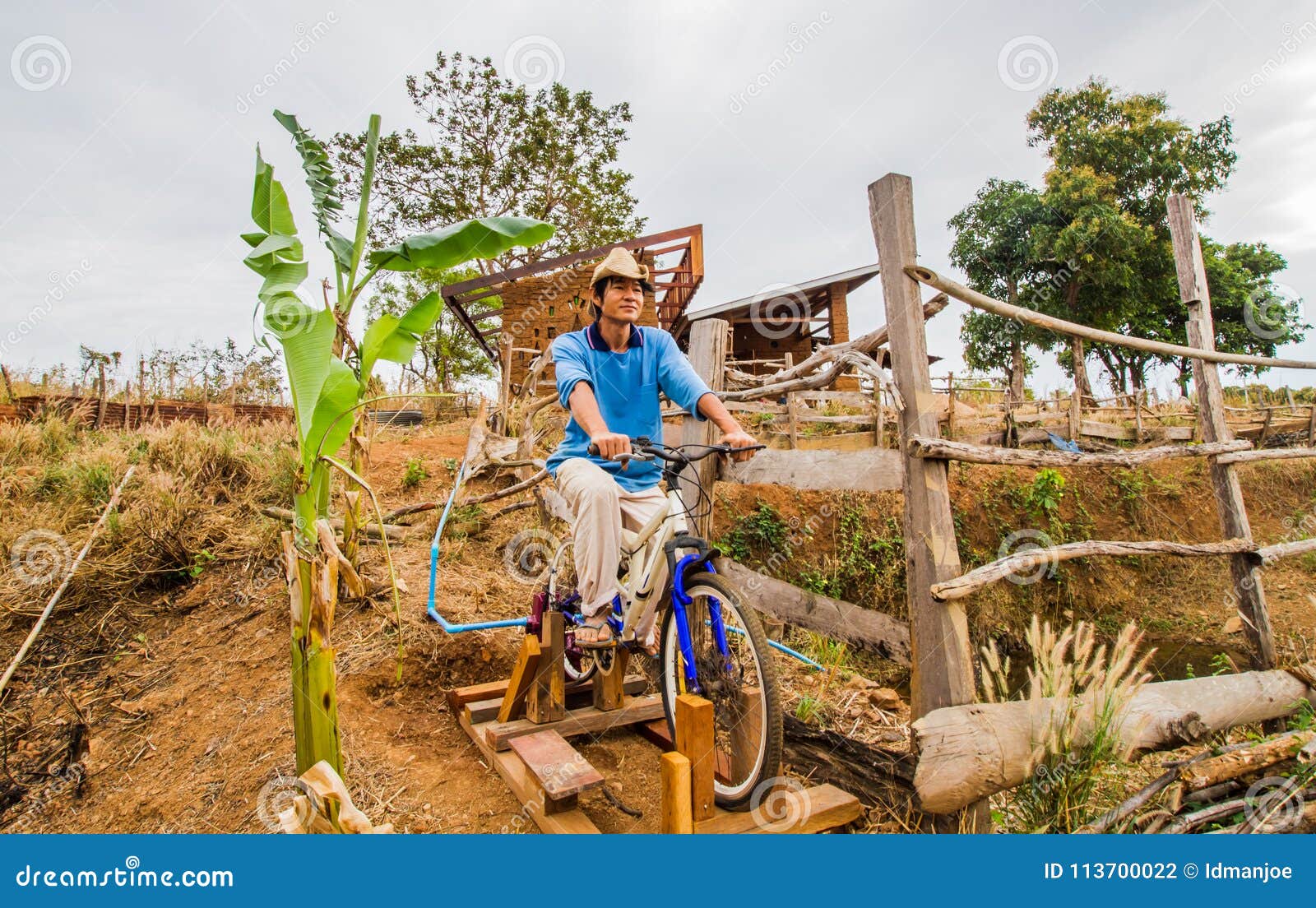 Bicycle for water pump stock photo. Image of exercise 113700022