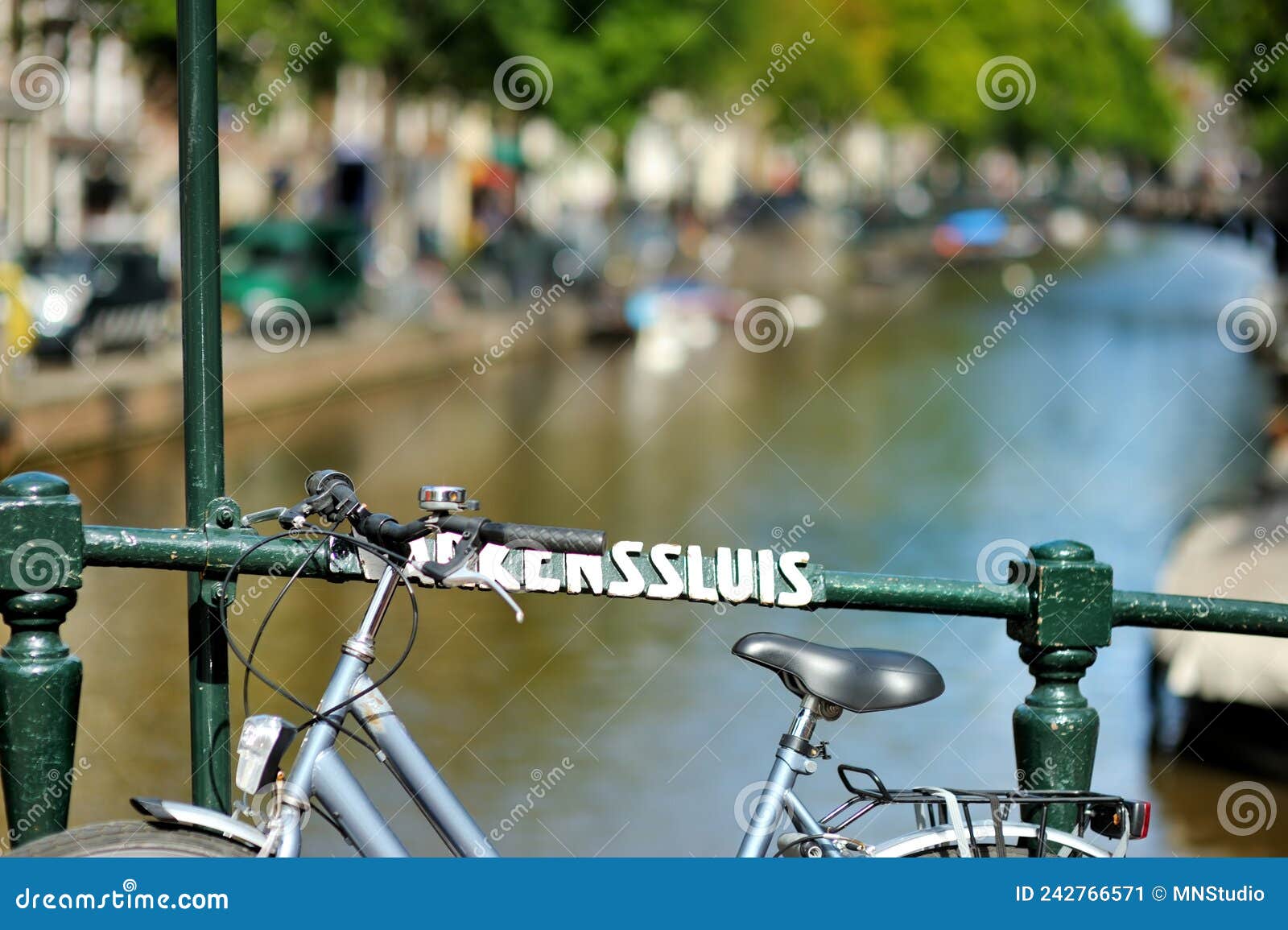 Bicycles Parked on the Bridge Over Canal in Amsterdam, Netherlands ...