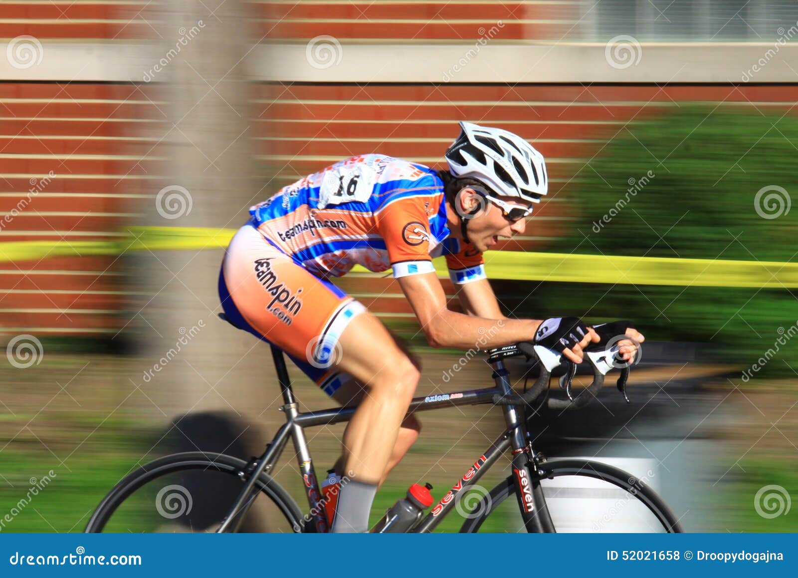 Bicycling on urban roadway editorial stock photo. Image of bicycling ...