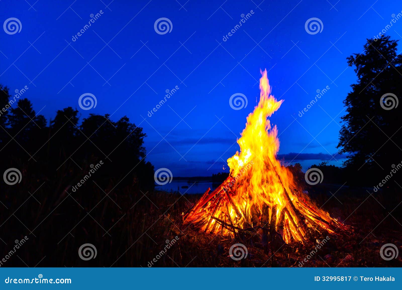 big bonfire against night sky