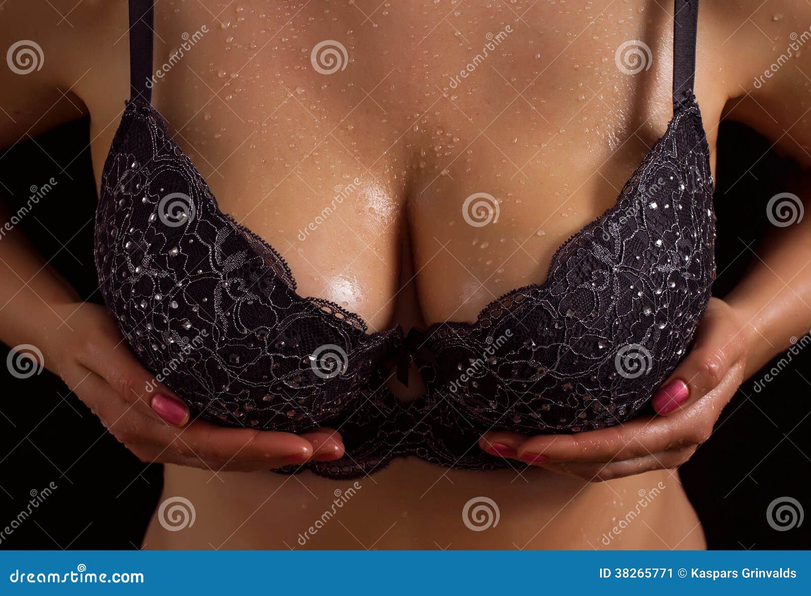 Big boobs in black bra stock image. Image of adult, hands - 38265771