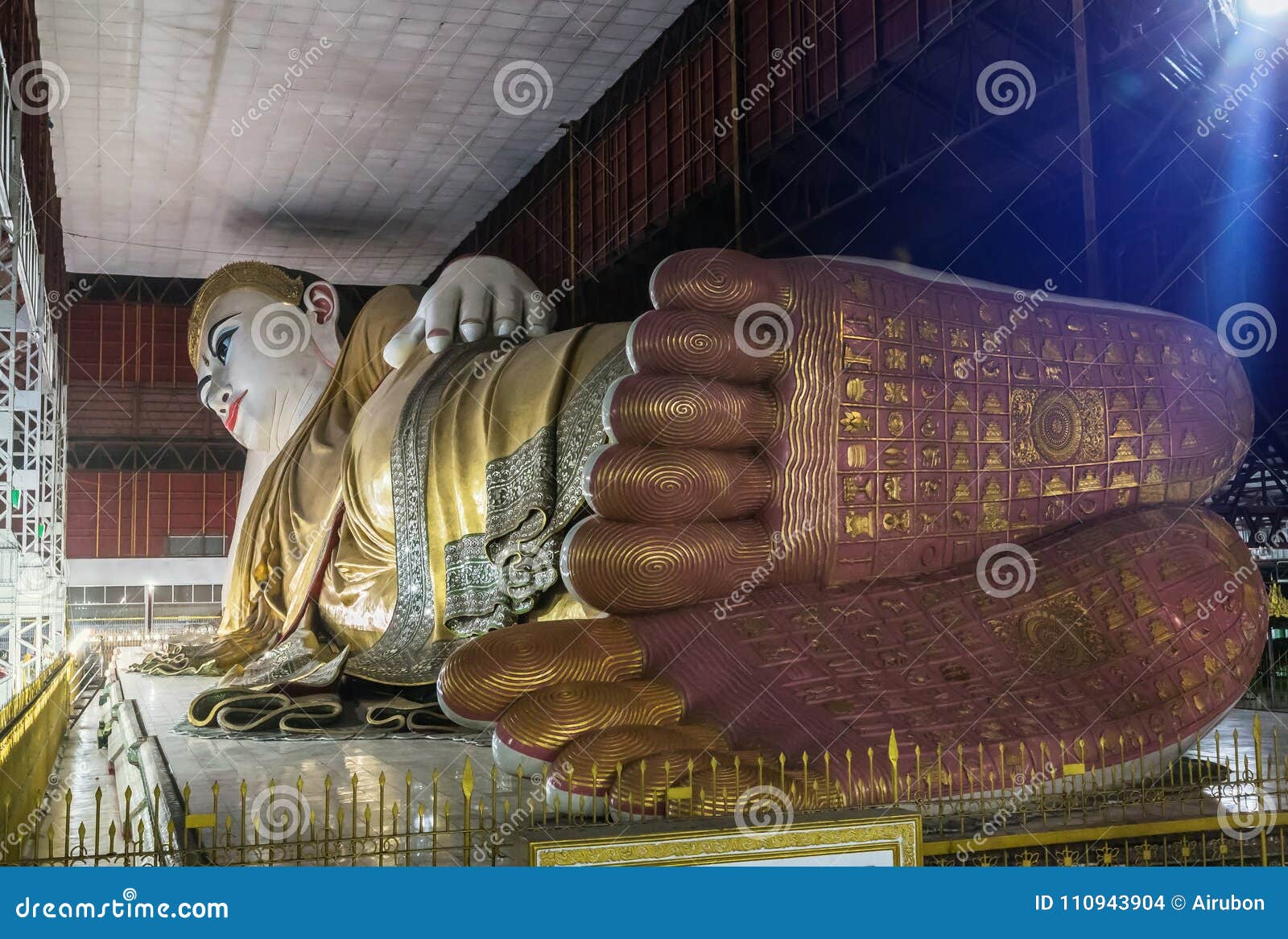 big buddha kyauk htat gyi reclining buddha statue in myanmar burma at night