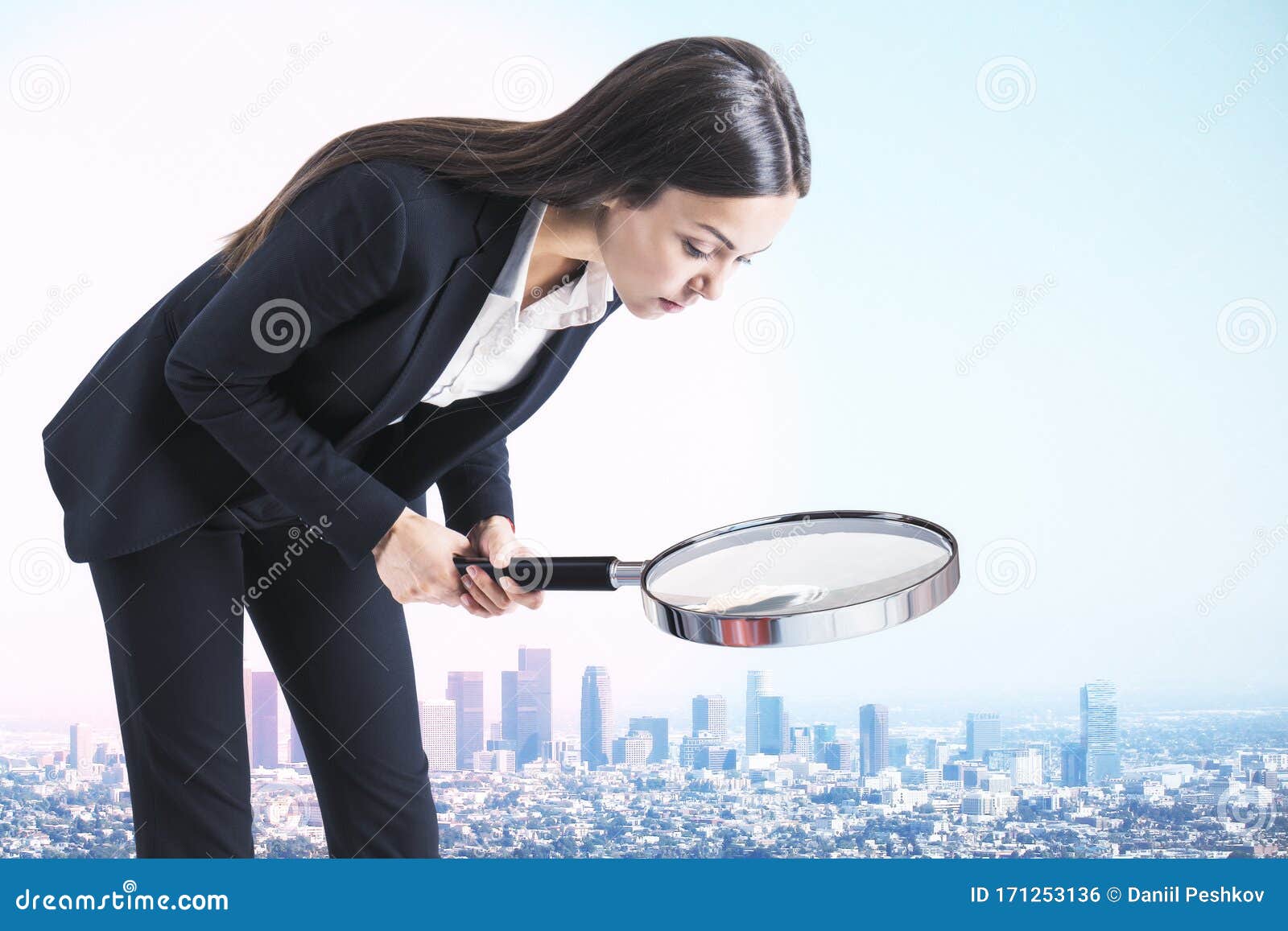 big businesswoman with magnifier