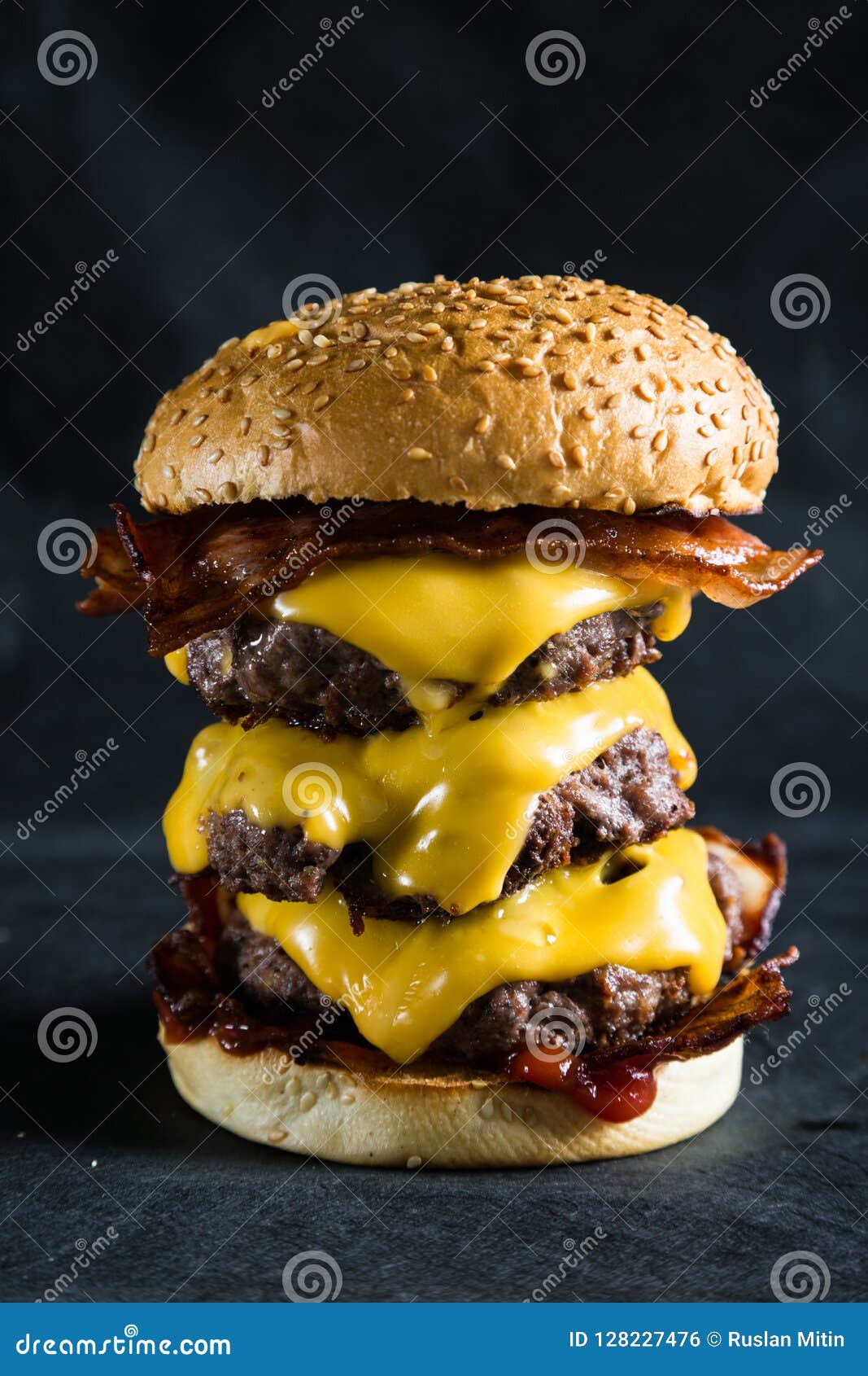 Big Cheeseburger on a Dark Background Stock Photo - Image of cheese ...