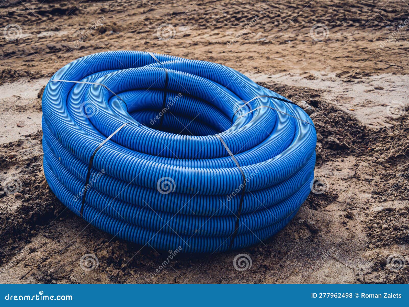 Big Construction Site with Pipes and Wires in the Construction Area