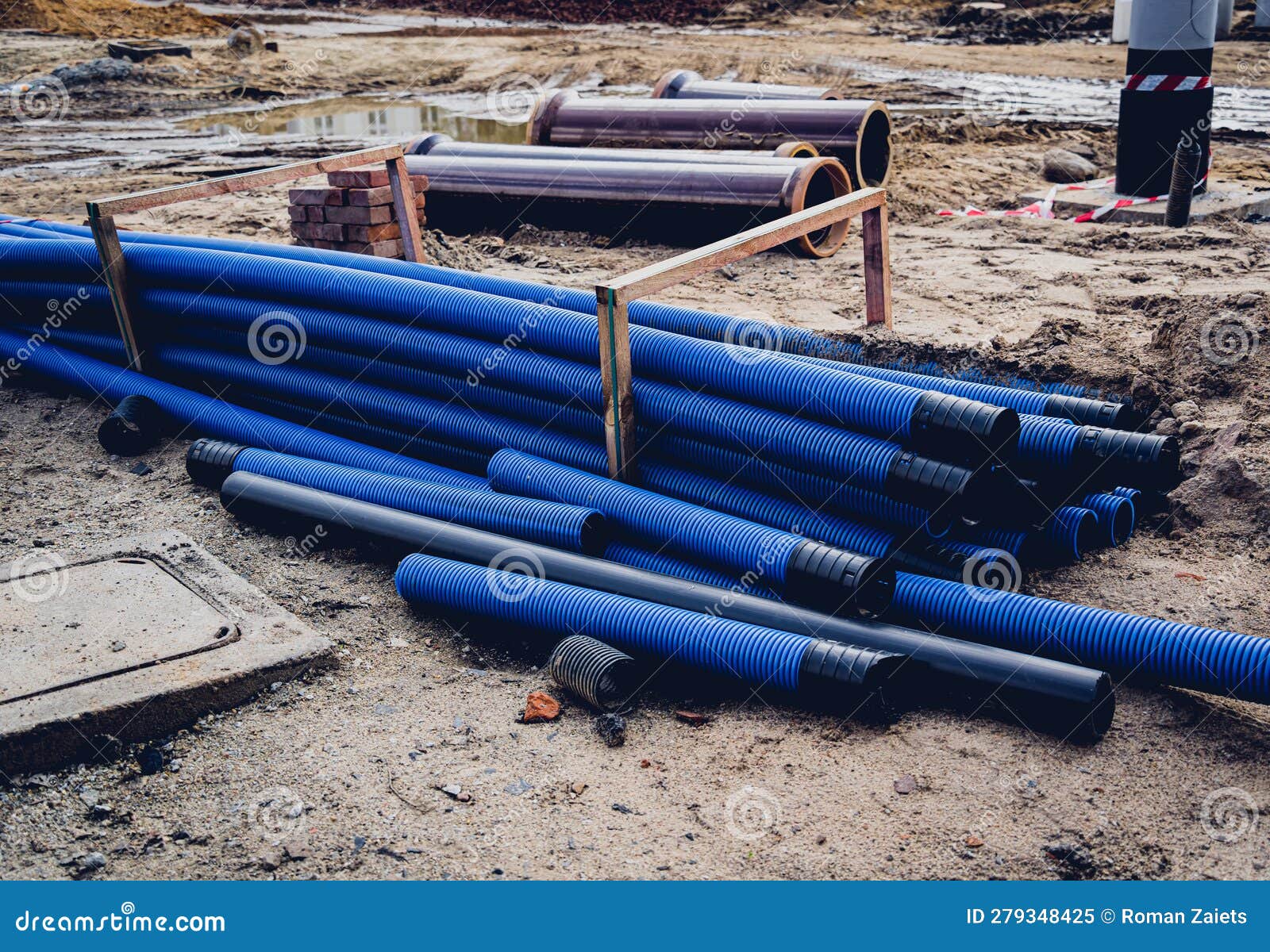 Big Construction Site with Pipes and Wires in the Construction Area